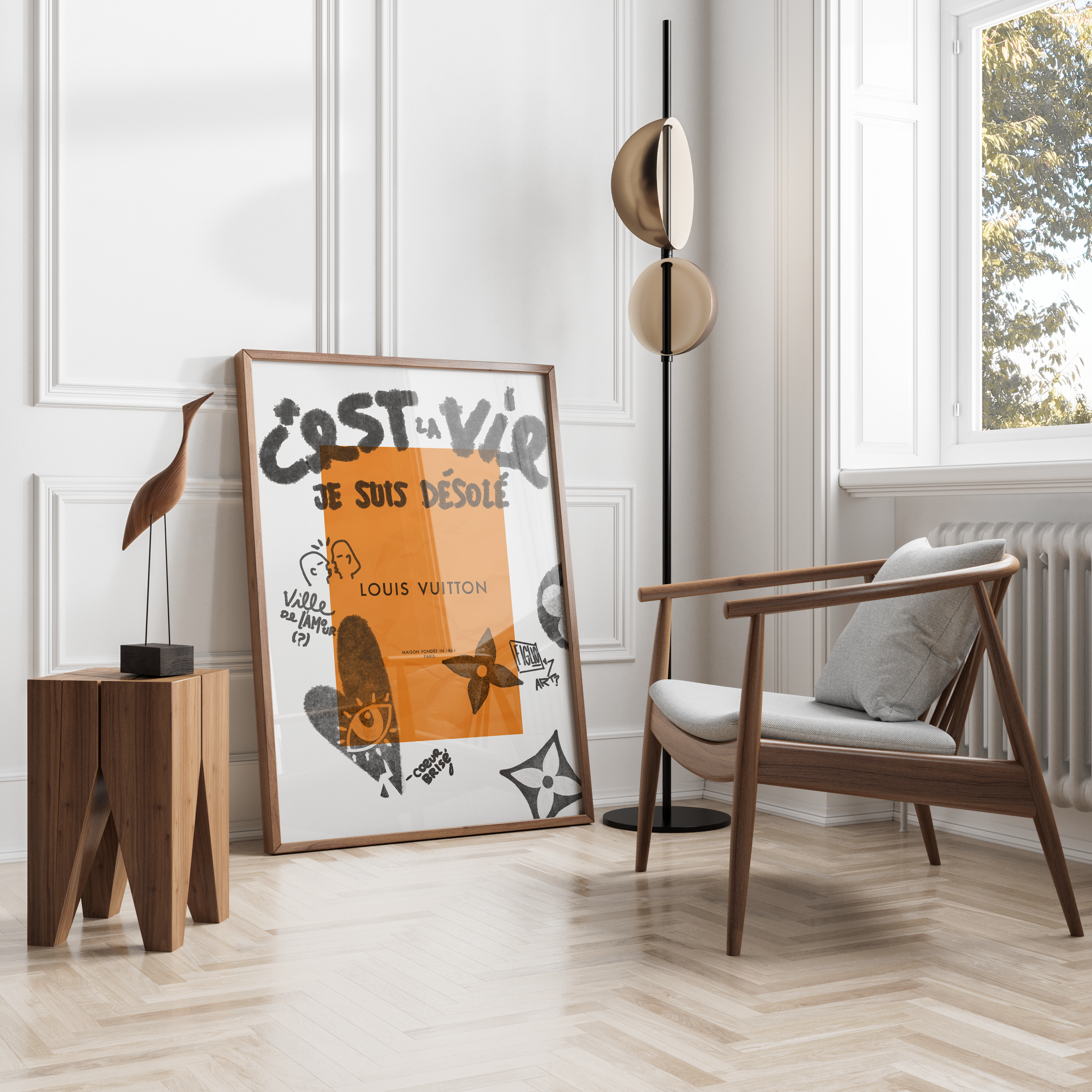 Living room with a Louis Vuitton poster, wooden chair, and side table.