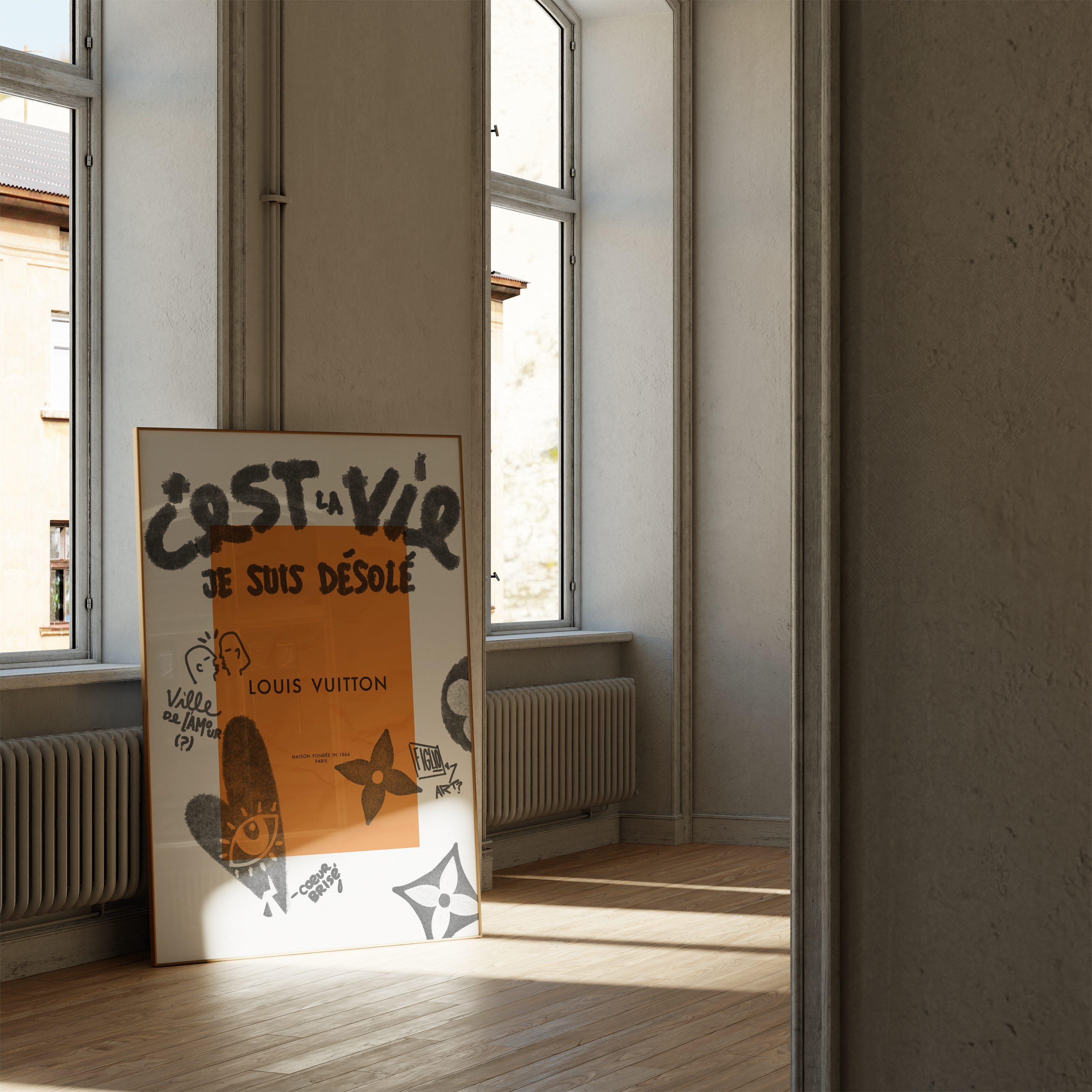 Framed artwork with text and graphics leaning against a wall in a room with large windows.